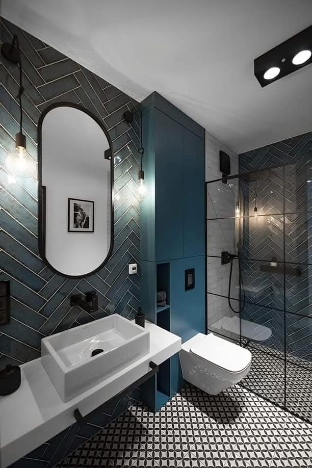 Electrical safety features in bathroom including GFCI, recessed lighting, and smart controls